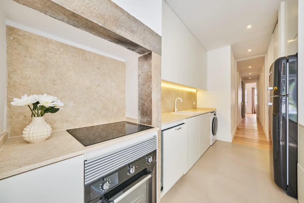 Modern kitchen inside apartment property for sale in Lisbon